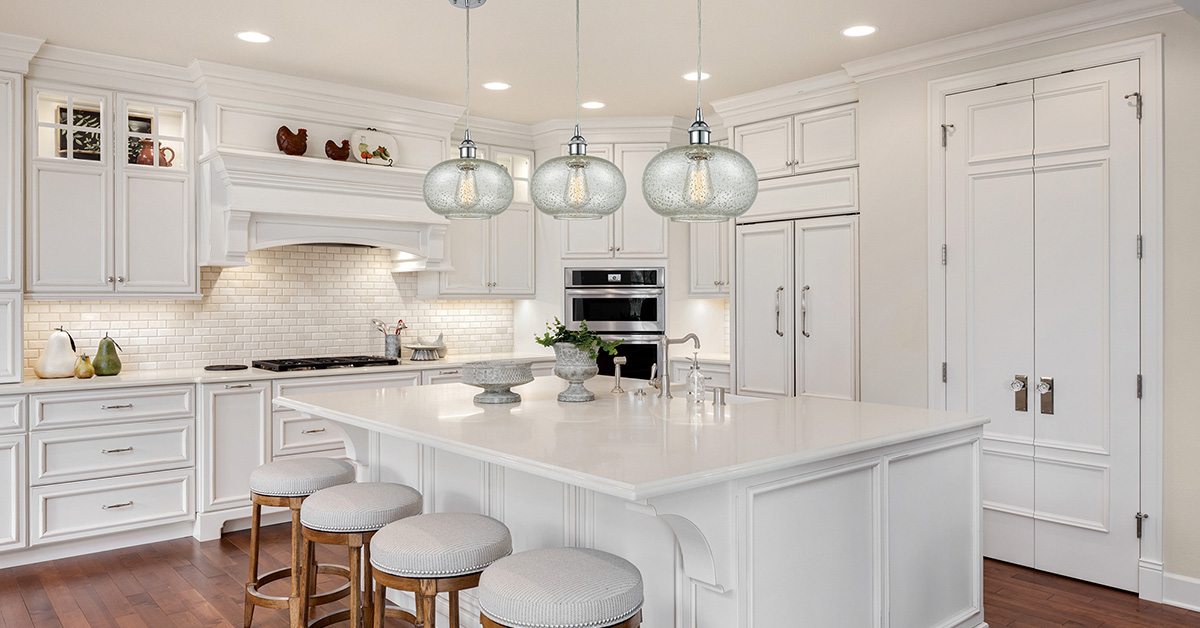 A luxury kitchen with recessed lighting 