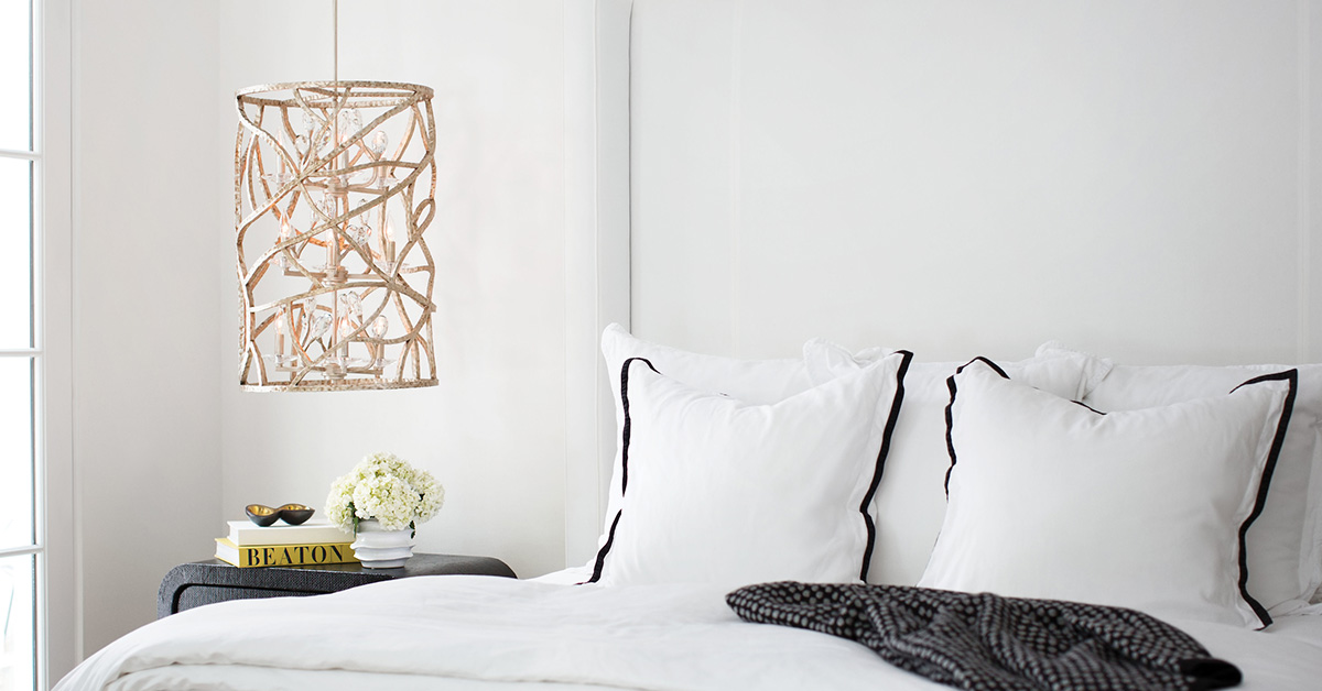 Bedroom with beautiful light fixture